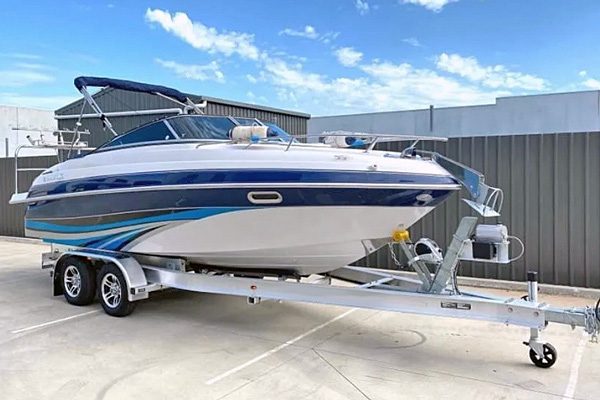 Boat and trailer on weighing pads